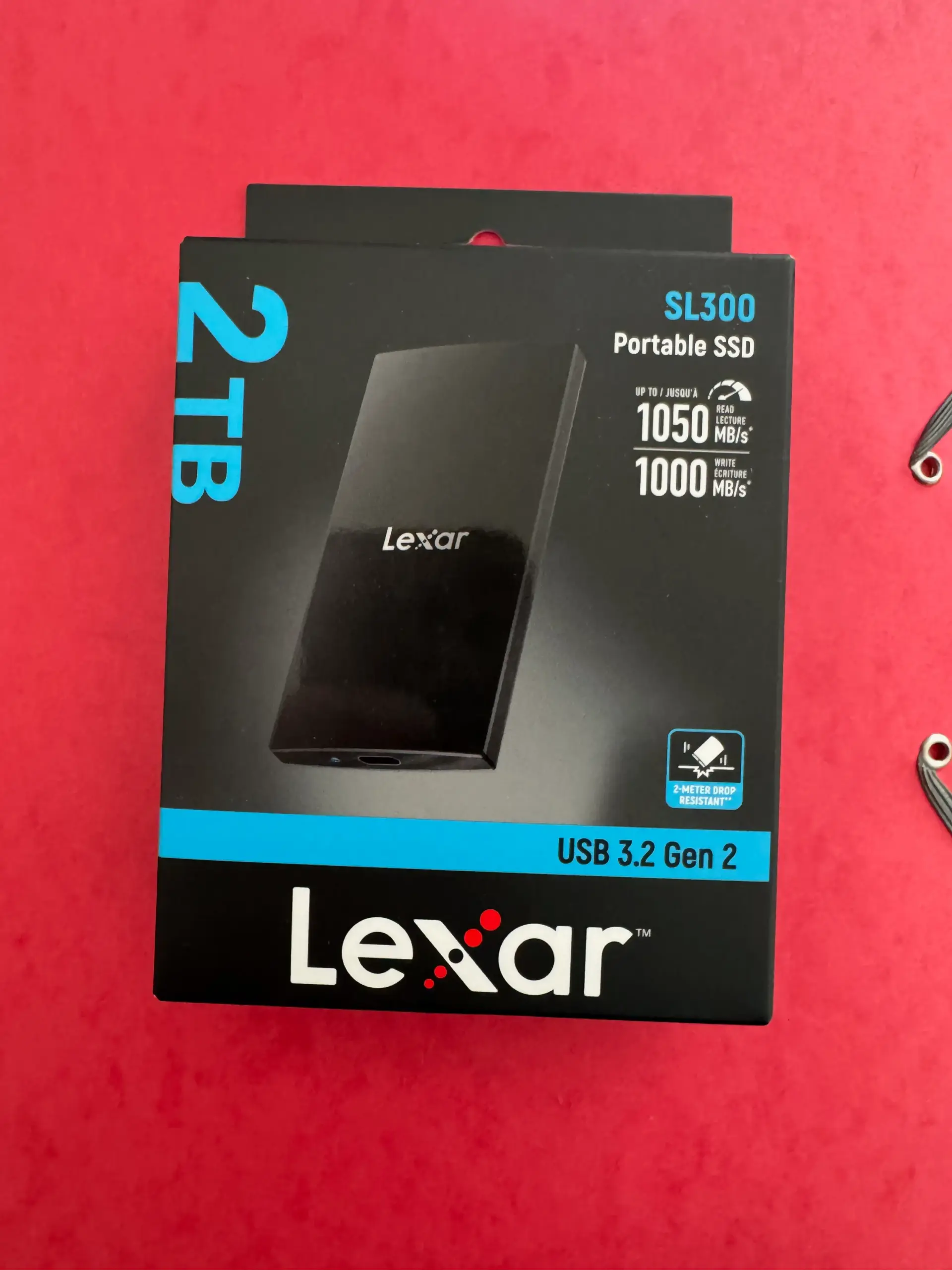 Lexar SL300 2TB portable SSD box showing USB 3.2 Gen 2 and 1050 MB/s read speed